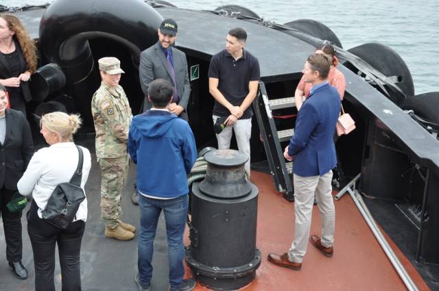 Commander Col. Julie Balten, U.S. Army Corps of Engineers Los Angeles District speaks with state, federal and port officials aboard the tugboat Teresa Brusco, June 28, 2021, at Port Hueneme, California.