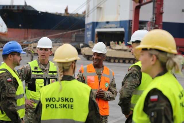 U.S. Army Lt. Col. J.D. Tillman, the commander of 838th Transportation Battalion, 598th Surface Deployment and Distribution Command and U.S. Army Capt. Morgan Keffer, 571st Movement Control Team, 53rd Movement Control Battalion, 16th Sustainment Brigade, welcomed members of the Polish Armed Forces to the Atlantic Resolve rotation in Gdansk, Poland, July 8th, 2021. The group did a walk through of the Liberty Peace vessel as well as the staging of equipment at the Port of Gdansk. (U.S. Army photo by Spc. Katelyn Myers)