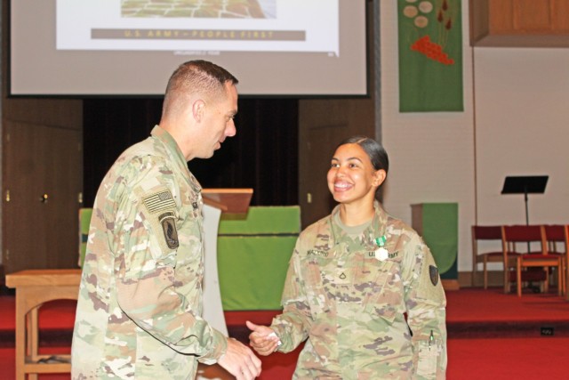 Soldier responds to house fire; saves father, son