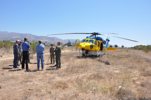 A Ventura County Fire Department helicopter crew provides a pre-flight safety briefing to U.S. Army Corps of Engineers Los Angeles District's two senior leaders, Col. Julie Balten and David Van Dorpe, July 1, 2021, in a field landing zone near...