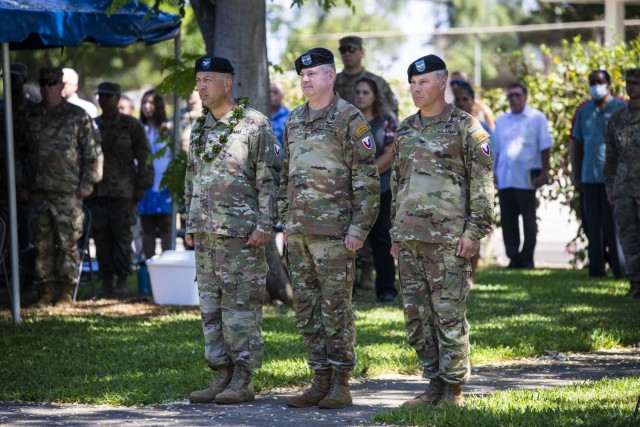 Col. Anthony T. Walters, 402nd outgoing commander, Maj. Gen. Chris Mohan, ASC commanding general, and Col. Erik C. Johnson, 402nd incoming commander, prepare for the change of command ceremony. The 402nd Army Field Support Brigade change of...