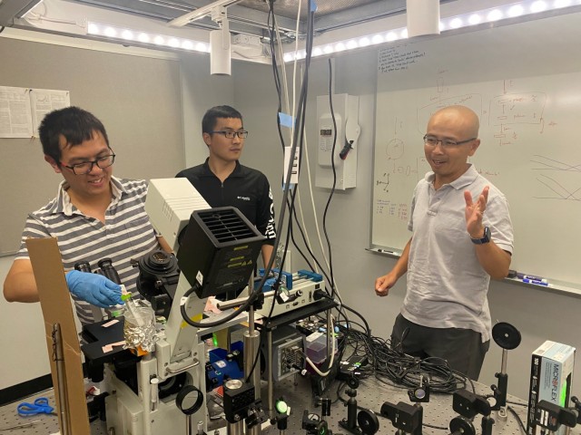 Dr. Rong Ye (left), Dr. Ming Zhao (center), and Dr. Peng Cheng (right) at Cornell discuss their Army-funded research that identifies a new chemistry approach that could remove micropollutants from the environment.