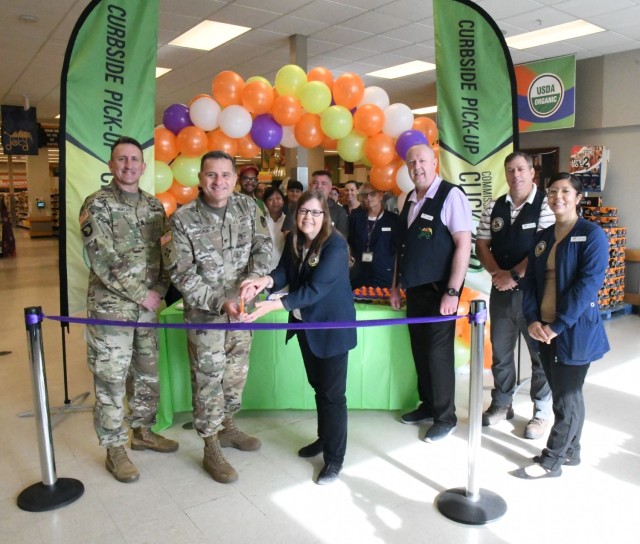 The Fort Drum Commissary officially launched its new Click2Go curbside service option with a ribbon-cutting ceremony July 13.The service allows customers to order groceries online and pick them up at a scheduled time and date of their choosing, without having to leave their vehicles. (Photo by Mike Strasser, Fort Drum Garrison Public Affairs)