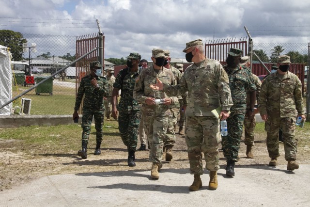 Maj. Gen. Rafael A. Ribas, deputy commander for mobilization and reserve affairs, U.S. Southern Command, receives a tour from Lt. Col. Timothy Starke, commander of 75th Troop Command, Kentucky National Guard during Tradewinds 21 at Camp...