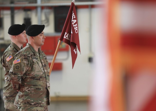 Soldiers stand at parade rest during the U.S. Army Health Clinic Kaiserslautern change of command ceremony where U.S. Army Maj. Shara Fisher relinquished command to U.S. Army Maj. Stephen Harmon at Kleber Kaserne, June 30. 