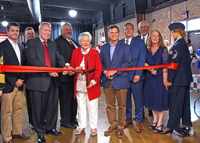 Alabama Gov. Kay Ivey, as well as other state and local officials, cut the ribbon to officially reopen the Alabama Veterans Museum & Archives July 1 in Athens, Ala.