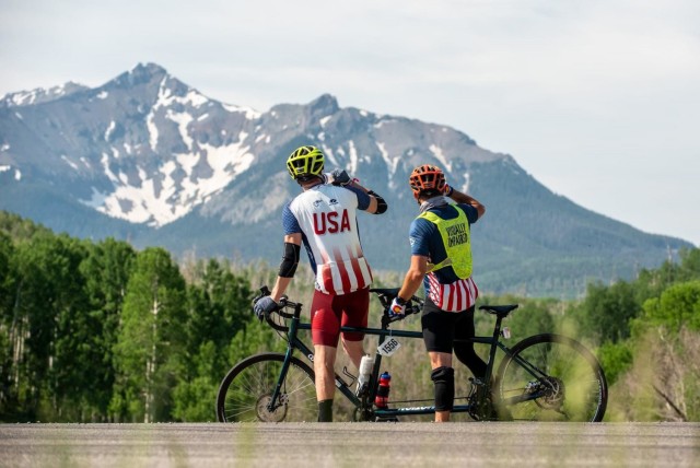 Adaptive Reconditioning Support Specialist Marc Cattapan (left) rides with Staff Sgt. Mike Murphy (right). Both are from the Fort Carson Soldier Recovery Unit in Colorado. (Photo courtesy of the Denver Post)