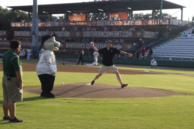 Command Sgt. Maj. George “Mike” Dove, then the command sergeant major of 3rd Combat Aviation Brigade, 3rd Infantry Division, throws out the first pitch at Military Appreciation Night honoring Savannah's military community Aug. 13, 2015, at...