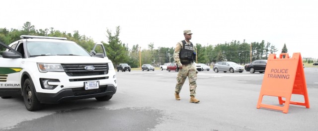 Soldiers from the 91st Military Police Battalion are evaluated on traffic stops during Mountain Guardian Academy training at Fort Drum. The academy is a blend of classroom lectures and hands-on practical exercises that tests Soldiers in a variety...