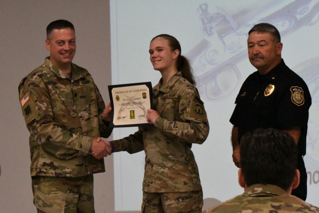 Pfc. Haley Lawhorn was named Guardian of the Cycle during the Mountain Guardian Academy graduation ceremony July 6, for her exceptional performance throughout the training. (Photo by Mike Strasser, Fort Drum Garrison Public Affairs)