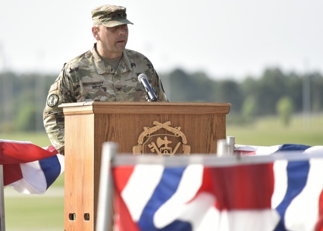 Col. Kirk Whittenberger addresses the audience after taking command of the 14th Military Police Brigade during a ceremony July 14 on Gammon Field.