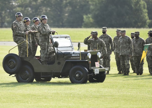 From left: Col. Kirk Whittenberger, incoming 14th Military Police Brigade commander, Brig. Gen. Niave Knell, U.S. Army Military Police School commandant, Col. Robert Arnold, outgoing 14th Military Police Brigade commander, and Lt. Col. Kathryn Shaw, commander of troops, review the troops during the 14th Military Police Brigade change-of-command ceremony July 14 on Gammon Field.