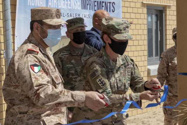 U.S. Army Brig. Gen. Kimberly M. Colloton, commanding general and division engineer of the U.S. Army Corps of Engineers, Transatlantic Division, and Kuwait Army Maj. Gen. Adel Al Hafez, commander with the Kuwait Air Defense Forces, cut the ribbon...