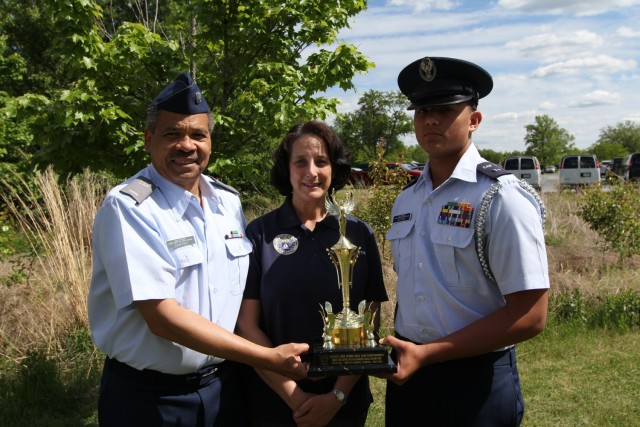 FORT GEORGE G. MEADE, Md. – The Courtney Family has made serving in Civil Air Patrol’s National Capitol Wing a Family affair. Dean Courtney (left), a resource manager with the 780th Military Intelligence Brigade (Cyber), is the Tuskegee Composite Squadron character development instructor; his spouse Victoria (center) is the Squadron’s deputy commander of cadets; and Dean Courtney II (right) is a sophomore at Chesapeake Math and IT (CMIT) Academy South, joined the Civil Air Patrol (CAP) when he was 12 years old, and is currently serving as the cadet deputy commander for his squadron.