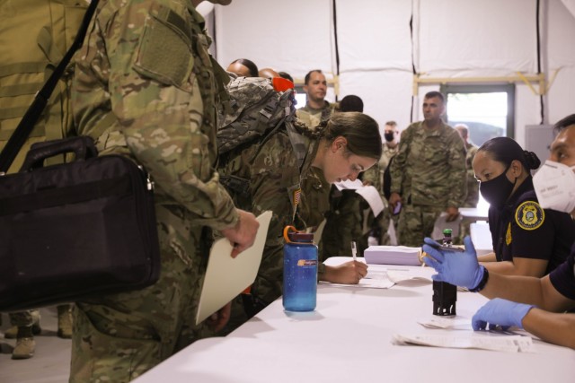 America’s First Corps Soldiers go through customs during the Forager 21 exercise at Anderson Air Force Base, Guam, July 10, 2021. Forager 21 bolsters the U.S. Army’s capability to rapidly deploy personnel and equipment in order to project power across a complex operational environment in the Pacific region. (U.S. Army photo by Sgt. David Resnick)