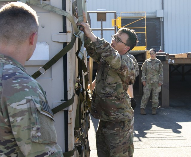 First Lt. Hunter Hill, a platoon leader with Signal Intelligence Service Company for America’s First Corps, prepares a container for Forager 21, at Joint Base Lewis-McChord, Wash., July 8, 2021. Exercise Forager demonstrates USARPAC’s strategic-level readiness by exercising the U.S. military’s ability to rapidly deploy a combat-credible force in support of the U.S. National Defense Strategy.