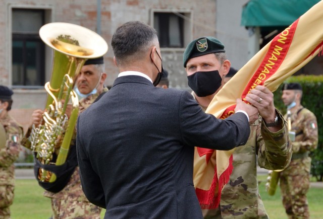 VICENZA, Italy (July 16, 2021) - Col. Daniel J. Vogel relinquished command July 16, 2021, to incoming commander Col. Matthew J. Gomlak during the United States Army Garrison Italy Change of Command Ceremony on Caserma Ederle’s Hoekstra Field.
Col. Gomlak arrived recently from the U.S. Army John F. Kennedy Special Warfare Center and School at Fort Bragg, North Carolina, where he served as the Chief of Staff, while Col. Vogel now heads to the Warfighting and Leadership Department at the Air War College in Alabama.