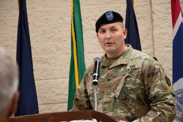 Col. Martin J. Hendrix III addresses the audience, including local-area officials, leadership from other Rock Island Arsenal-based commands and members of the Rock Island Arsenal – Joint Manufacturing and Technology Center workforce, during the RIA-JMTC change of command ceremony, July 15 at Rock Island Arsenal, Ill. Hendrix served as the 50th commander of the unit for two years and retires with 25 years of service. (U.S. Army photo by Debralee Best/RIA-JMTC)