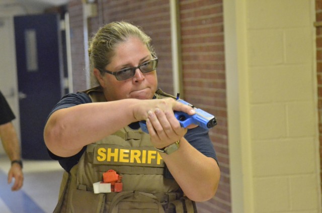 Sergeant Thomasa Munroe, Montgomery County Sheriff’s Office, takes point in a simulated response to an active shooter, part of an Active Attack Integrated Response training course hosted July 12-16 at Jackson Elementary School.