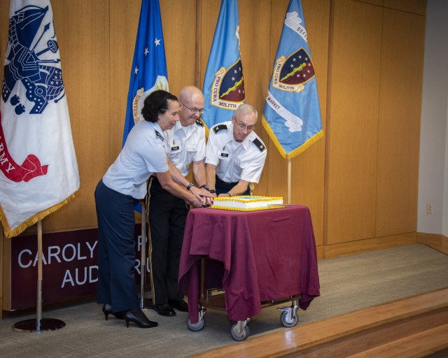 Air Force Brig. Gen. Jeannine M. Ryder, 59th Medical Wing commander and San Antonio Market director, left, Army Lt. Gen. Ronald J. Place, director of the Defense Health Agency, center, and Army Col. Michael Wirt, Brooke Army Medical Center...