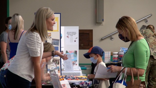 Educators and supporting partner agencies offer information and advice to members of the Fort Huachuca, Ariz. community during a “Back to School” fair.