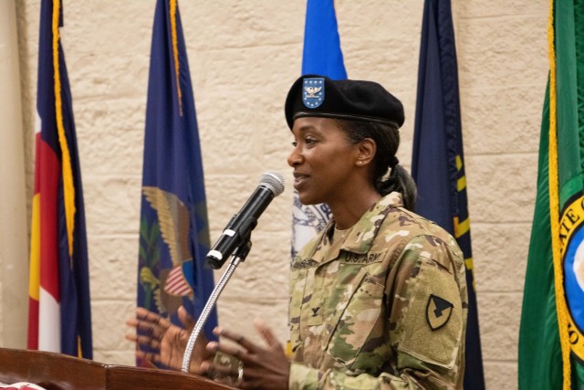 Col. Shari Bennett addresses the audience, including local-area officials, leadership from other Rock Island Arsenal-based commands and members of the Rock Island Arsenal – Joint Manufacturing and Technology Center workforce, during the RIA-JMTC change of command ceremony, July 15 at Rock Island Arsenal, Ill. Bennett serves as the 51st commander of the unit as well as the first female and first black officer to command the unit. (U.S. Army photo by Debralee Best/RIA-JMTC)