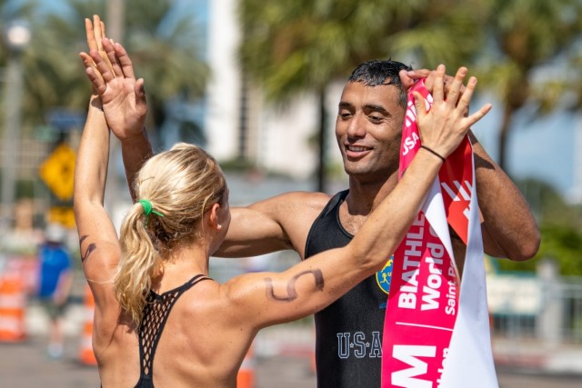 Sgt. Amro Elgeziry, right, is congratulated by Sgt. Samantha Schultz during the 2019 Biathle/Triathle World Championships in St. Petersburg, Florida. Both Elgeziry and Schultz will compete in the modern pentathlon at the Olympic Games in Tokyo.
