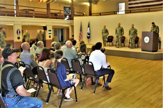 Garrison leaders stand at attention after Command Sgt. Maj. Paul Mantha, former Fort McCoy Garrison command sergeant major, received the Legion of Merit in a special awards presentation ceremony July 1, 2021, at Fort McCoy, Wis. Garrison Commander...