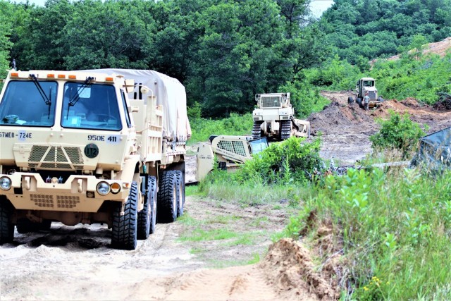Soldiers with the Wisconsin National Guard's 950th Engineering Company (Route Clearance) work on a troop project at a training area July 12, 2021, at Fort McCoy, Wis. The work is part of a troop project coordinated by the Fort McCoy Directorate of...