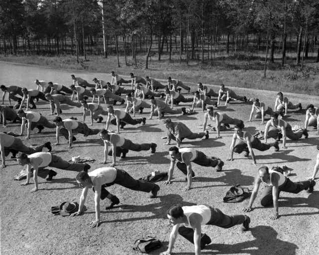 Group calisthenics for patients in the Camp McCoy, Wis., Station Hospital &#34;reconditioning program&#34; are shown  Aug. 15, 1955. (U.S. Army photo)