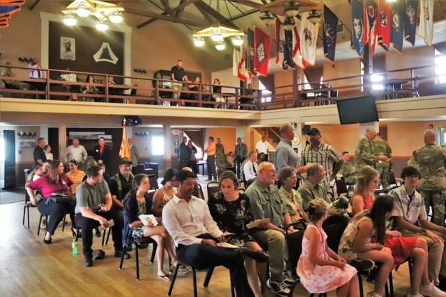 Audience members watch as Command Sgt. Maj. Raquel DiDomenico becomes the new Fort McCoy Garrison command sergeant major July 1, 2021, during a change of responsibility ceremony at Fort McCoy, Wis. DiDomenico replaced Command Sgt. Maj. Paul Mantha as the garrison command sergeant major during the ceremony. She has previously served at Fort McCoy at the Fort McCoy Noncommissioned Officer Academy. A command sergeant major (CSM) is the most senior enlisted member of a color-bearing Army unit. The CSM is appointed to serve as a spokesman to address the issues of all soldiers, from enlisted to officers, from warrant officers and lieutenants to the Army’s highest positions. As such, they are the senior enlisted advisor to the commander. The exact duties vary depending on the unit commander, including observing training and talking with Soldiers and their families. (Photo by Scott T. Sturkol, Public Affairs Office, Fort McCoy, Wis.)