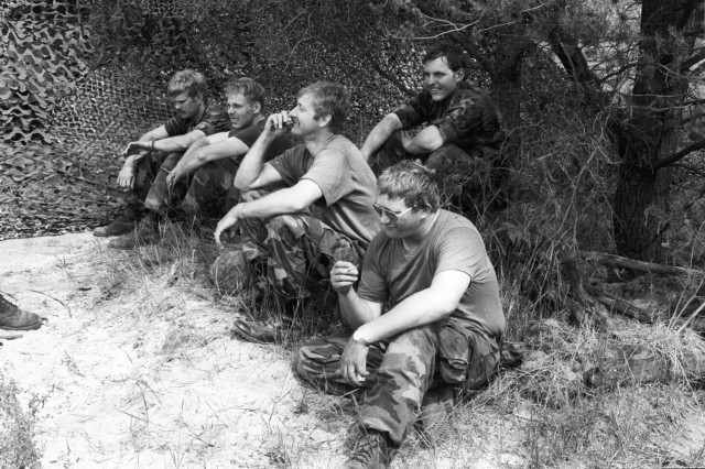 Soldiers take a break during training in summer 1984 at Fort McCoy, Wis. (U.S. Army file photo)