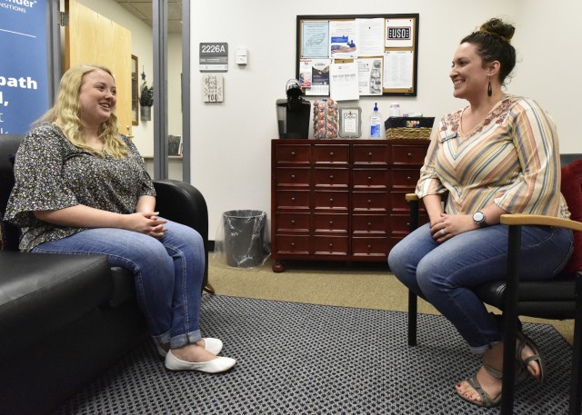 Casey Thompson (right) is a transition specialist with the United Service Organizations’ Transitions Pathfinder Program, who oversees the Fort Leonard Wood Spouses Employment Lounge. She meets with Hannah Hooven, a military spouse getting ready...