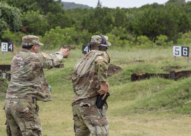 Soldiers from the 120th Infantry Brigade, fire a SIG Sauer M17 service pistol during a concealed carry weapons training event, July 10, 2021, at Fort Hood, Texas. The training effort was coordinated by the 43rd Military Police Detachment (Criminal Investigative Division), the 1-393rd Brigade Support Battalion and the 2-337th REGT, Training Support Battalion (CS/CSS) (Wolverines), both part of the 120th Infantry Brigade, for the 403rd Civil Affairs Battalion, in preparation for an overseas mission and to train Soldiers from the 120th on how to conduct the class for future deploying units. (U.S. Army Reserve Photo Staff Sgt. Erick Yates)