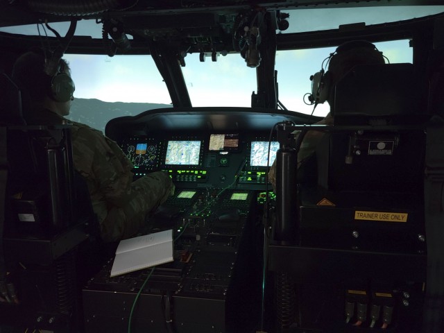 Two Black Hawk helicopter pilots with the Tenn. ARNG, conduct a simulated mission during CABAIL TIE 21-1.