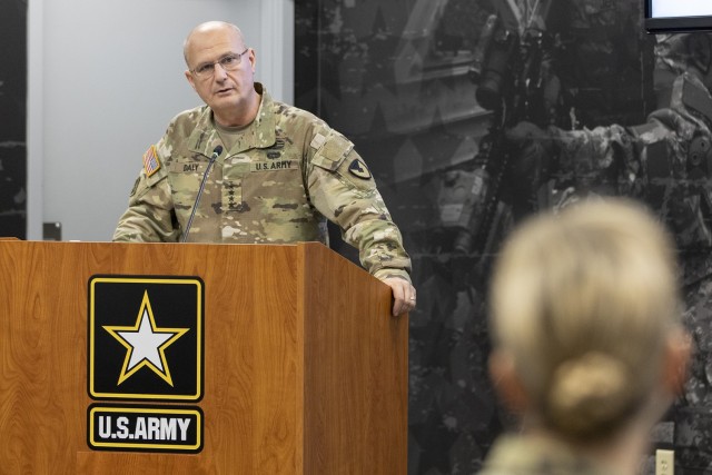 Gen. Edward M. Daly, U.S. Army Materiel Command commanding general, speaks to Col. Paige M. Jennings, U.S. Army Financial Management Command commander, shortly after Jennings assumed command at the Maj. Gen. Emmett J. Bean Federal Center in Indianapolis July 15, 2021. USAFMCOM enables the readiness of America’s Army by serving as the focal point for all finance and comptroller operations while providing capabilities that facilitate accountability, auditability and stewardship. (U.S. Army photo by Mark R. W. Orders-Woempner)