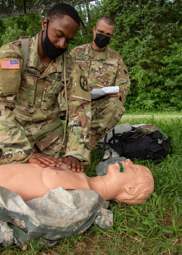Cadet Deonte Mayfield, Morehouse College, applies a bandage to a simulated gunshot wound as part of the First Aid test at Warrior Skills at Fort Knox, Ky., on June 21, 2021. The Warrior Skills training event consists of two parts, Call for Fire and First Aid, that will be important for any Cadet to have knowledge when leading their future soldiers. | Photo by Jacob Hempen, CST Public Affairs Office