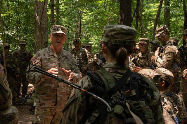 Gen. Paul E. Funk II, Commanding General, U.S. Army Training and Doctrine Command (TRADOC), talks to Cadets from 8th Regiment, Advanced Camp, during their Field Training Exercise (FTX) at Fort Knox, Ky., on July 19, 2021. Besides observing their training, Funk provided mentorship and answered questions from the Cadets during his visit. | Photo by Oscar Fuentes, Cadet Summer Training Public Affairs office.
