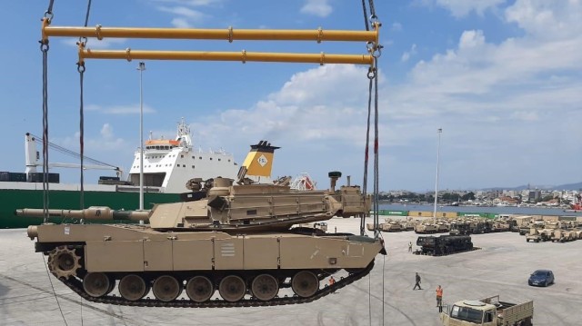 An M1A2 tank assigned to the 1st Armored Brigade Combat Team, 1st Infantry Division arrives at the port facility in Alexandroupoli, Greece, July 20, 2021. This is the first time the U.S. Army has deployed tanks, Bradley Fighting Vehicles and other tracked equipment through the port. The 1st ABCT is arriving for its nine-month deployment to the European theater in support of Atlantic Resolve.
