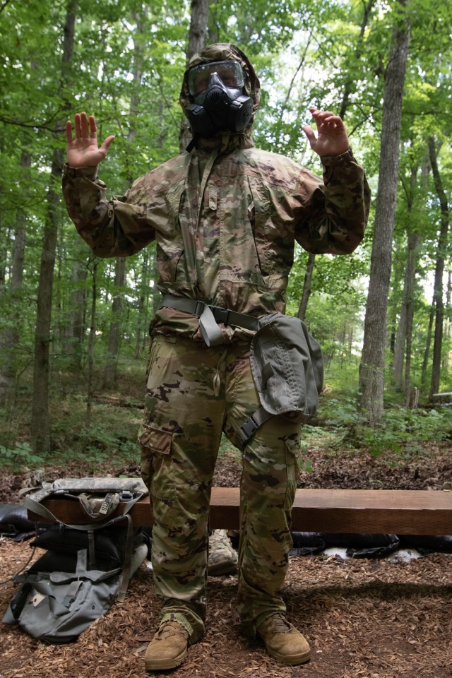Karl Jackson, a cadet from Princeton University, completes donning his Mission Oriented Protective Posture (MOPP) gear prior to the eight minutes time goal set by the Cadre during the Chemical, Biological, Radiological and Nuclear (CBRN) training event at Fort Knox, Ky., on July 2, 2021. The MOPP gear is worn by troops to protect against exposure to CBRN agents. | Photo by Oscar Fuentes, Cadet Summer Training Public Affairs office.