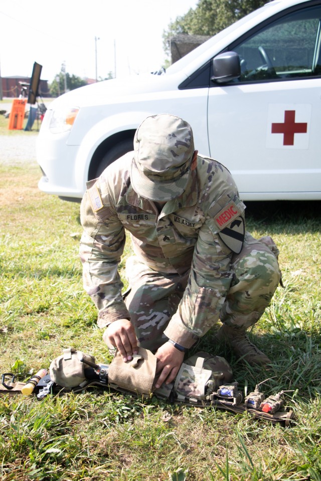 Sgt. Miguel Flores adjusts his gear at Warrior Skills at Advanced Camp at Fort Knox, Ky on July 7, 2021. | Photo by Marissa Wells, CST Public Affairs Office.