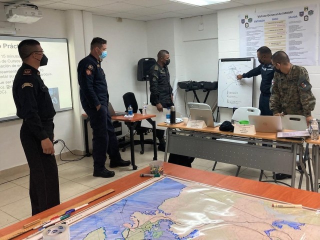 Members of Joint Task Force Alpha work through step 2 (Describe Environmental Effects on Operations) of the Intelligence Preparation of the Battlefield.