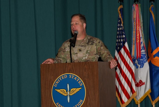 U.S. Army Maj. Gen. Walter T.  Rugen, director of the Future Vertical Lift Cross Functional Team based at Redstone Arsenal, Alabama, speaks about the future vertical lift ecosystem in large scale combat operations during Aviation Industry Days at Fort Rucker, Alabama, July 21, 2021. (U.S. Army photo by Kelly Morris)
