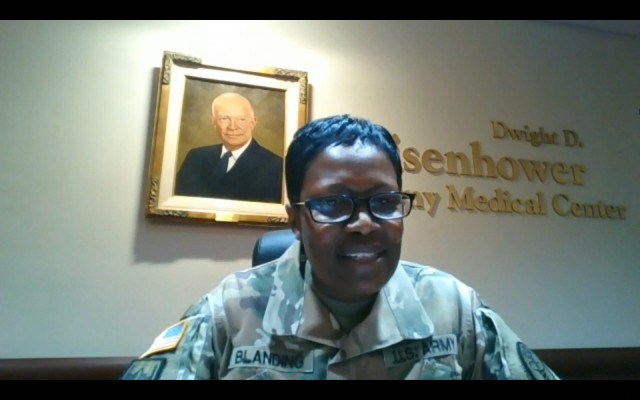Col. Carlene Blanding, commander of the Eisenhower Army Medical Center at Fort Gordon, Ga., applauds the efforts of her medical staff and Soldiers for successfully transitioning operations during the COVID-19 pandemic during a livestream discussion on July 22, 2021. 