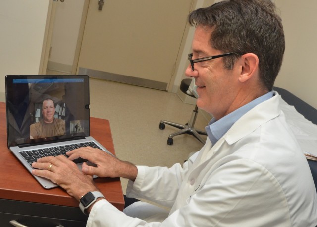JACKSONVILLE, Fla. (March 1, 2018) -- John Hawley, a neurologist at Naval Hospital Jacksonville, provides virtual care using the Navy Care app. Navy Care enables patients to have a virtual visit with a clinician, by using a smartphone, tablet, or computer. It’s private, secure, and free.  (U.S. Navy photo by Jacob Sippel, Naval Hospital Jacksonville/Released).