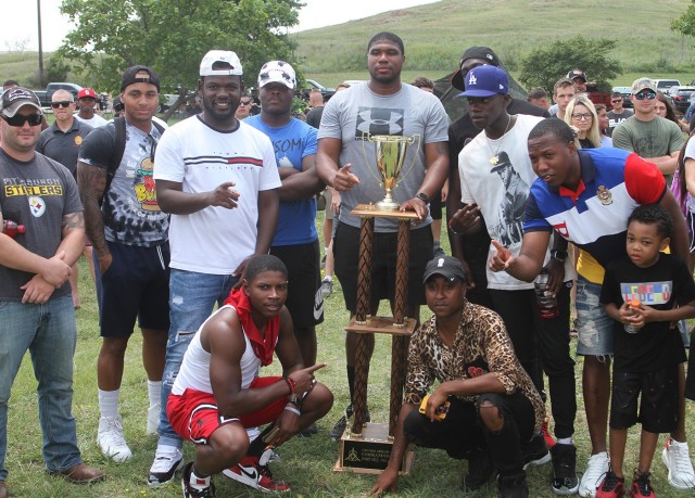 1st Battalion, 14th Field Artillery Soldiers pose with their trophy for winning the commander’s cup July 22, 2021, at Fort Sill, Oklahoma. The 75th Field Artillery Brigade celebrated its 100th anniversary with sports competitions and observances...