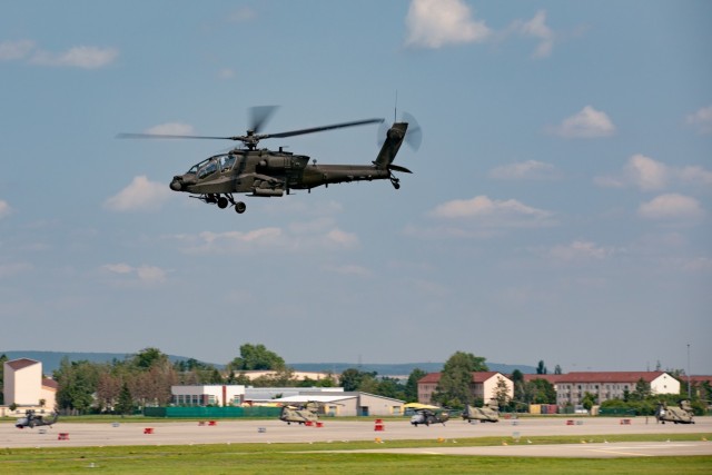 A U.S. Army AH-64 Apache Attack Helicopter flown by Charlie Company “Ghost Riders,” 1st Battalion, 1st Aviation Regiment, 1st Combat Aviation Brigade, flies over Illesheim Army Airfield, Germany, July 22, 2021. The 1CAB is currently deployed to Germany in support of Atlantic Resolve. Regional security in Europe continues to be a top priority for the U.S., and utilizing rotational forces allows for more flexibility to deter threats when they arise. 