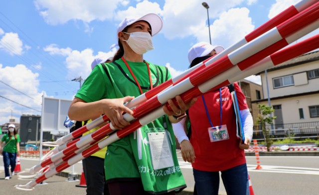 U.S. Army Japan volunteers help local city host Olympic events