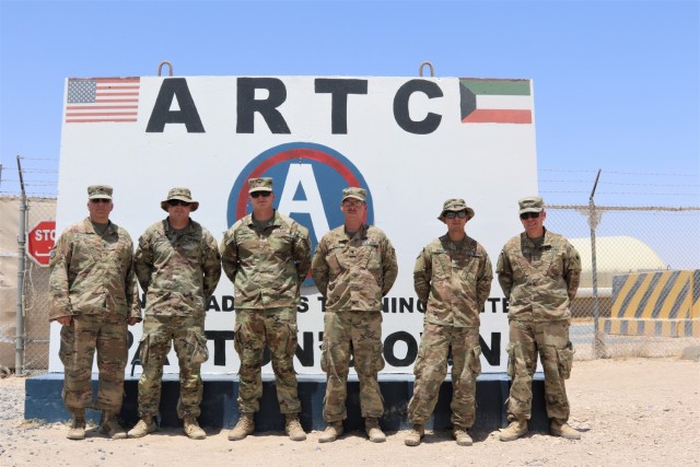 From left, Chief Warrant Officer 4 Douglas Montgomery, Staff Sgt. Richard Recupero, Staff Sgt. Thomas Daniel, Spc. Curtis Hicks, Sgt. Ismael Pulido and Chief Warrant Officer 2 Anthony Meneely pose for a photo after the completion of a Counter Radio-Controlled Improvised Explosive Device Warfare (CREW) course at Camp Buehring, Kuwait.