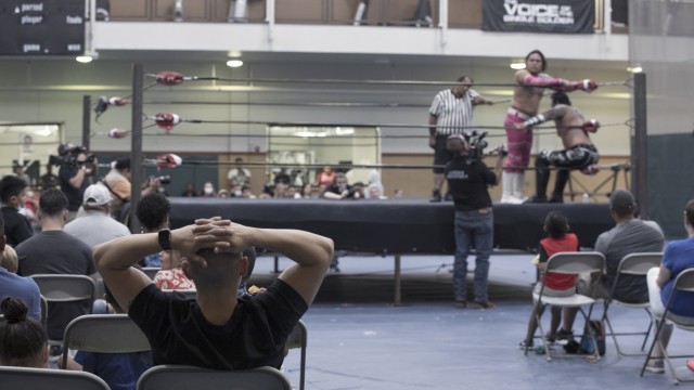 Soldiers and families enjoy Lucha Libre wrestling at the Sgt. Joshua W. Soto Physical Fitness Center at Fort Bliss, Texas, July 23, 2021. Fort Bliss FMWR invited Lucha Frontera, a regional Lucha Libre wrestling production, on post for a free show for Bliss Soldiers, civilians, and their families and guests.